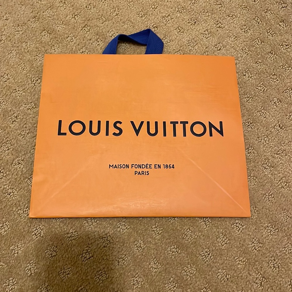 Louis Vuitton shopping bag empty